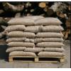Wood pellets of gray color in 15 kg bags